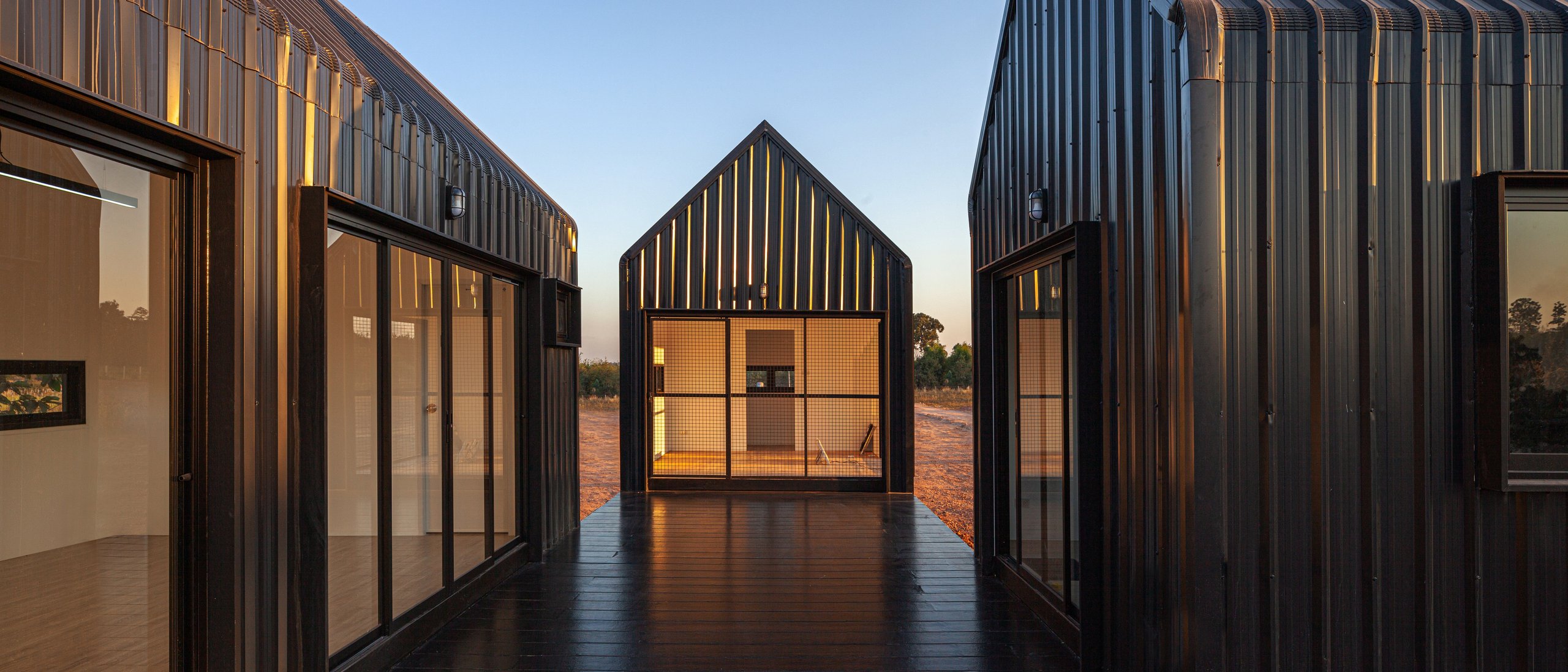 Modern barn-style cabins with metal exteriors